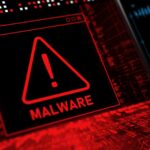 Red malware warning screen on a dark cybersecurity dashboard